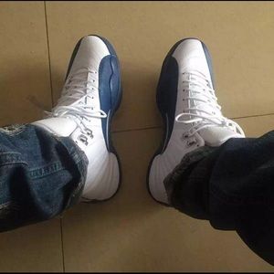 white and blue jordan 12s